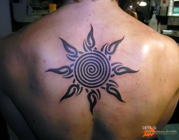 Spiral Sun Tattoo On Upper Back For Men