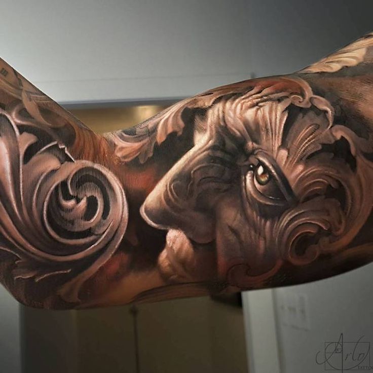 Surreal 3d Face Tattoo On Arm