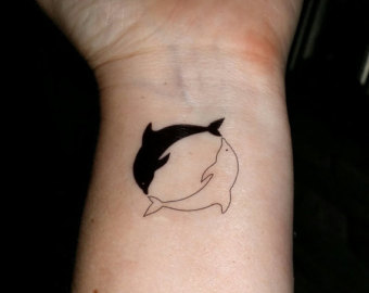 Temporary Two Dolphins Circle Tattoo On Wrist