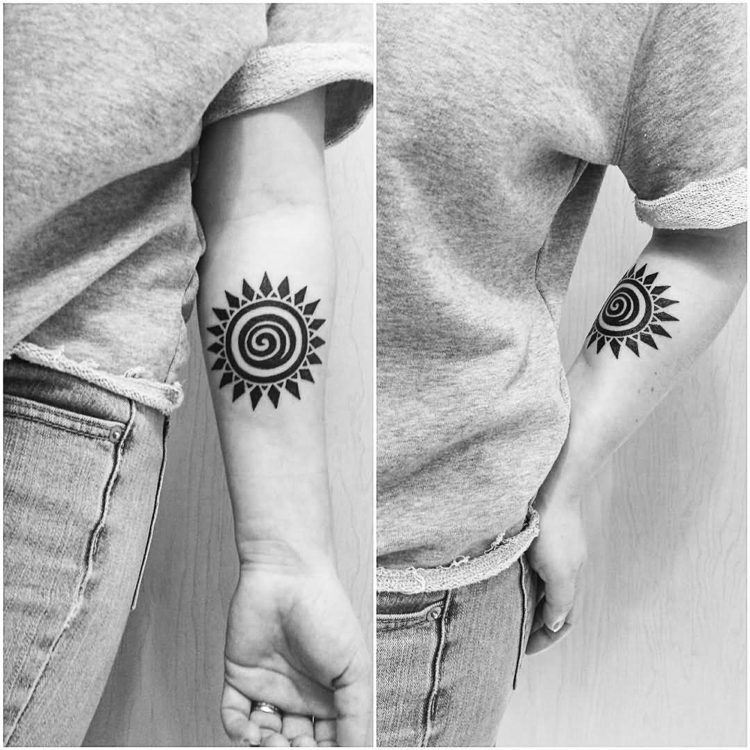 Tribal Sun Tattoo Design On Forearm