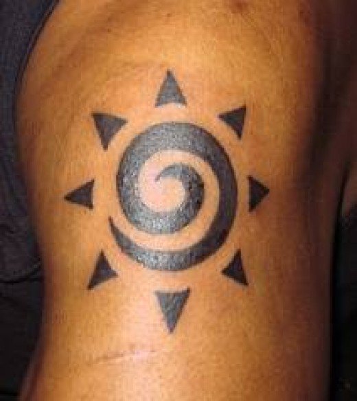 Tribal Sun Tattoo Design On Upper Arm