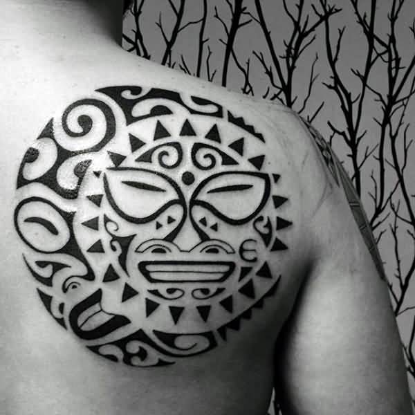 Tribal Sun Tattoo On Men’s behidn