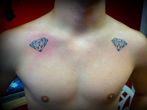 Two Diamond Tattoos On Mans Collar Bone