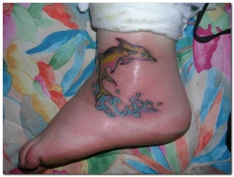 Two Dolphins With Water Splash Tattoo On Ankle