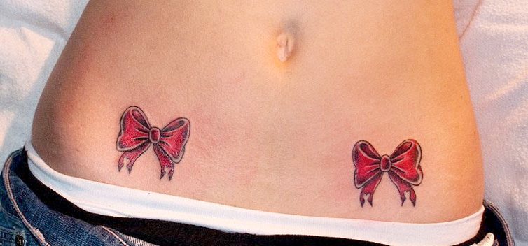 Two Red Bow Tattoos On Stomach