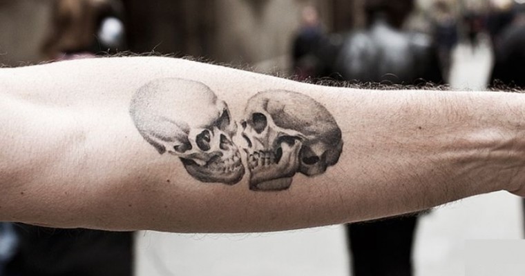 Two Skulls Tattoo On forearm