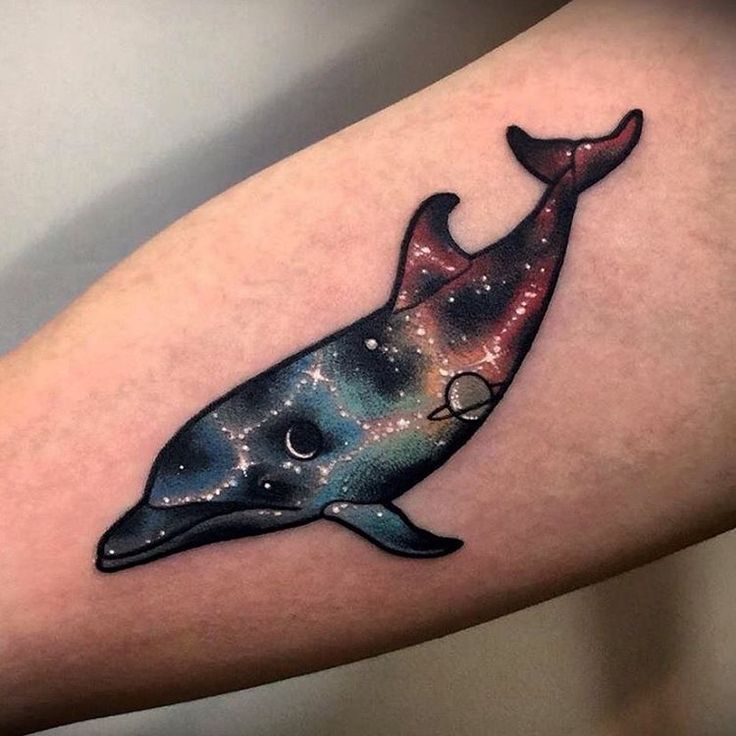 Unique Space Dolphin Tattoo Design