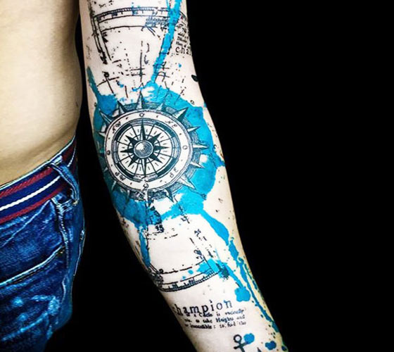 Water Color Nautical Compass tattoo On Forearm