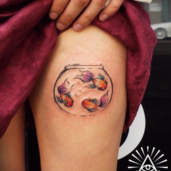 Watercolor Fish Pot tattoo On thigh