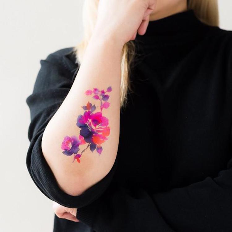 Watercolor Flowers tattoo On elbow