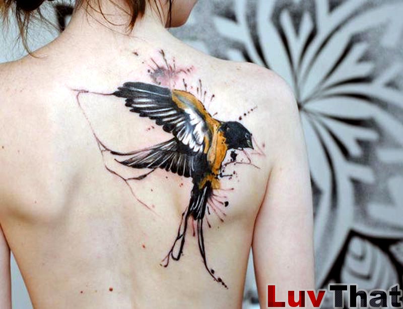 Watercolor Flying Bird Tattoo On girls back