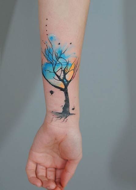 Watercolor Tree tattoo on forearm