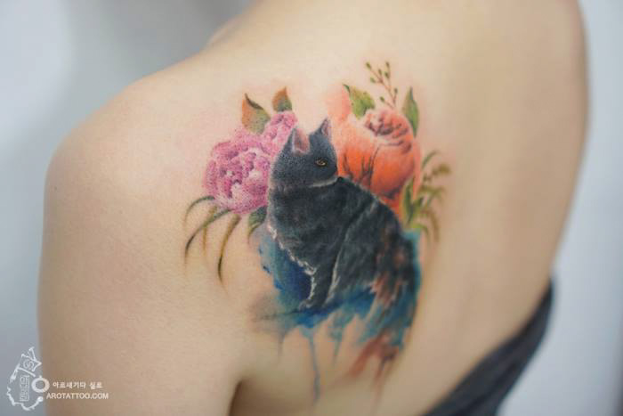 Watercolor black Cat With Flowers tattoo On back