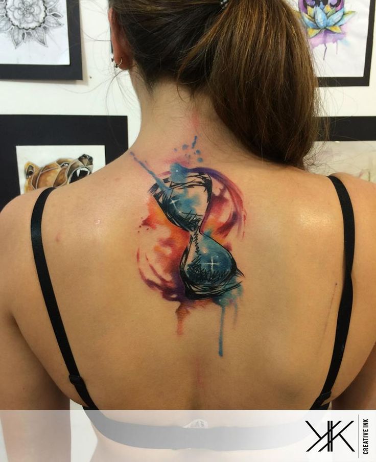 Watercolor hourglass Tattoo On Girls Back