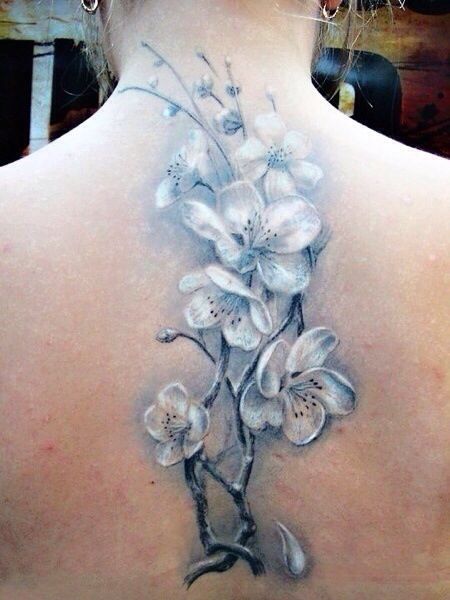 White Orchid Branch Tattoo On Back