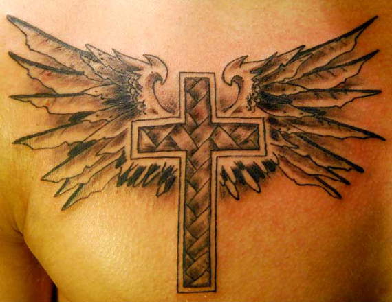 Winged Cross Tattoo On Man Front Shoulder