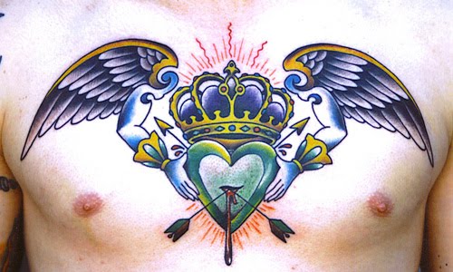 Winged Crown With Heart Tattoo On Chest