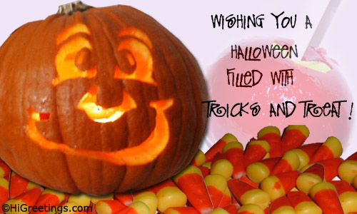 Wishing You A Halloween Filled With Tricks And Treat pumpkin and candy cone image