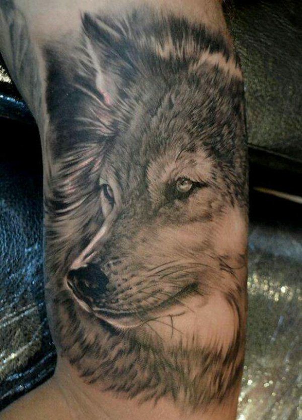 Wolf Face Tattoo On Bicep