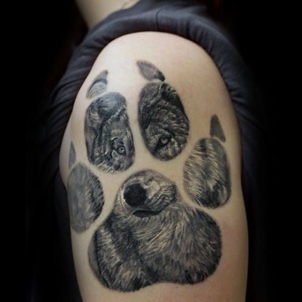 Wolf Paw Print Tattoo On Upper Arm