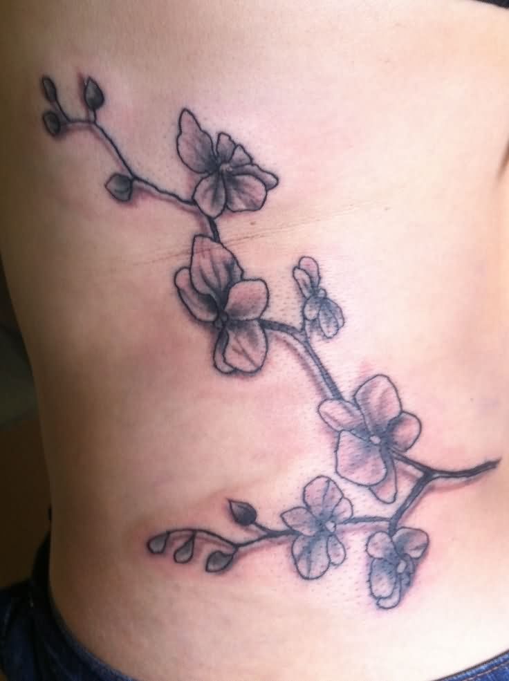grey Ink Orchid branch Tattoo On side Rib