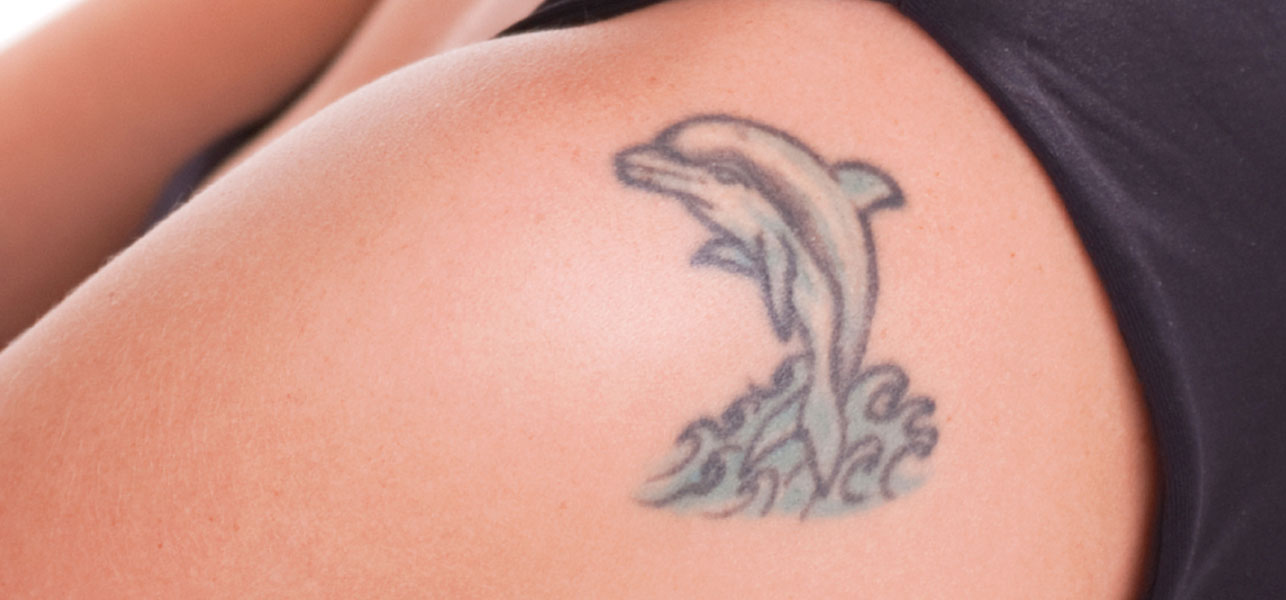 jumping Dolphin Tattoo On Thigh