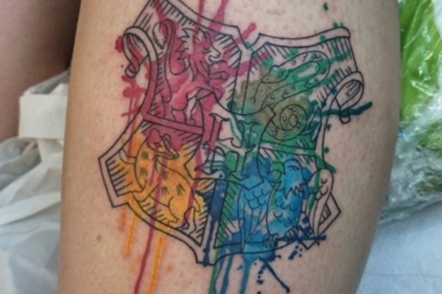 watercolor warrior Shield tattoo