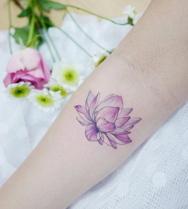 Adorable Pink Lotus Tattoo On Arm