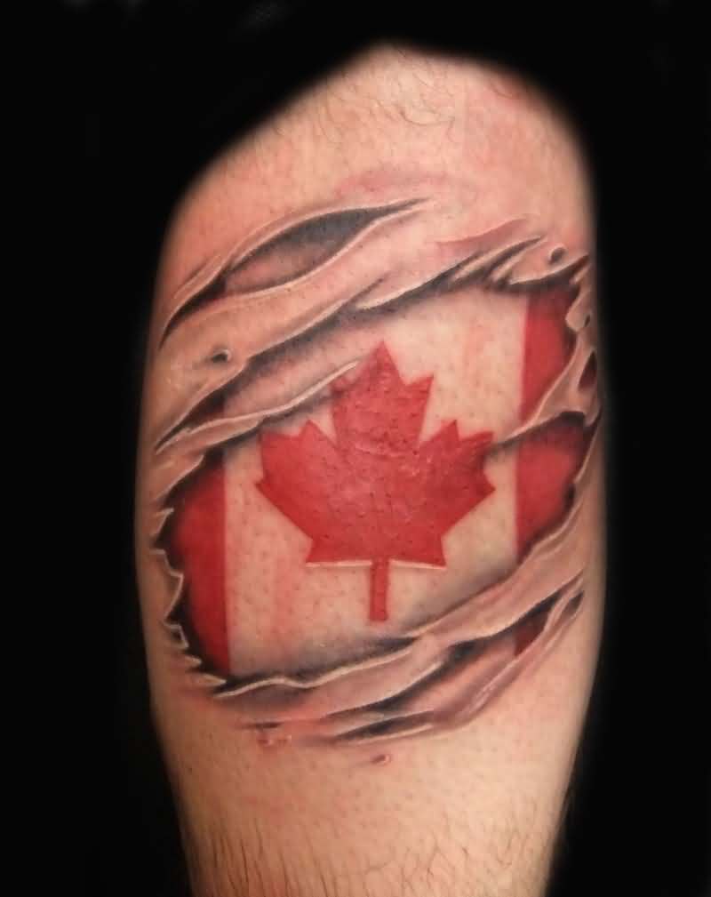 Adorable Ripped Skin Canadian Flag Tattoo On Thigh