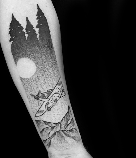 Airplane Flying Over Mountains Travel Tattoo On Forearm