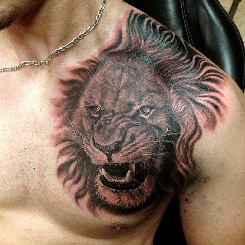 Angry Lion Face Tattoo On Shoulder
