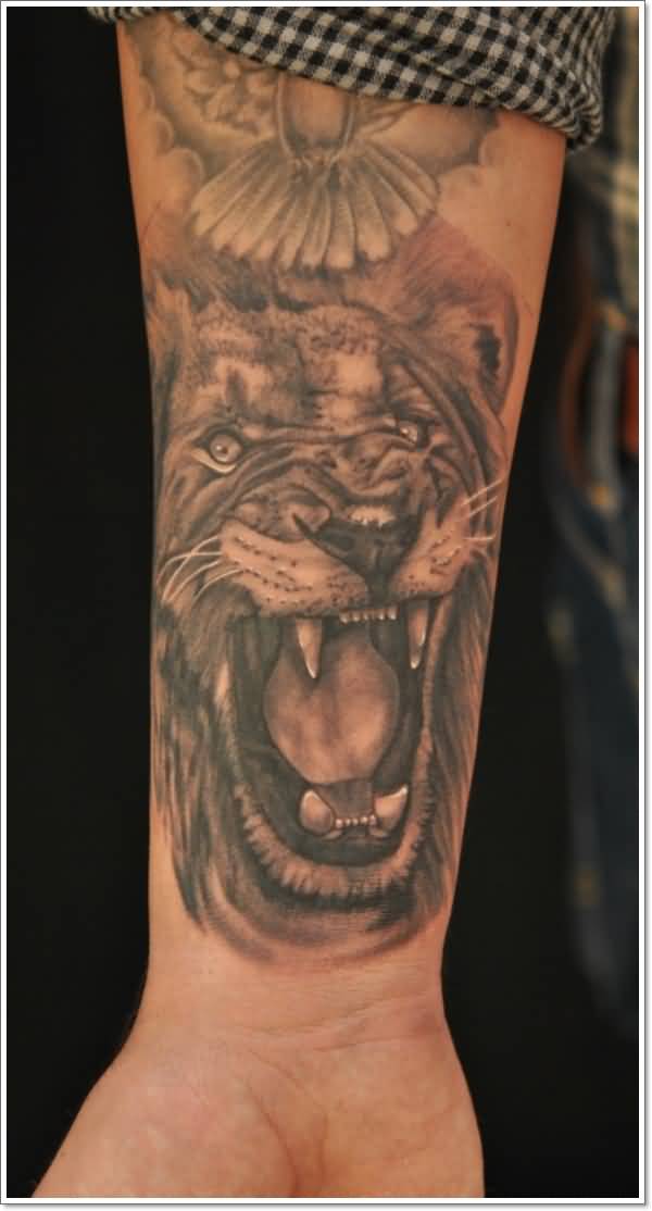 Angry Lion Face Tattoo On Wrist
