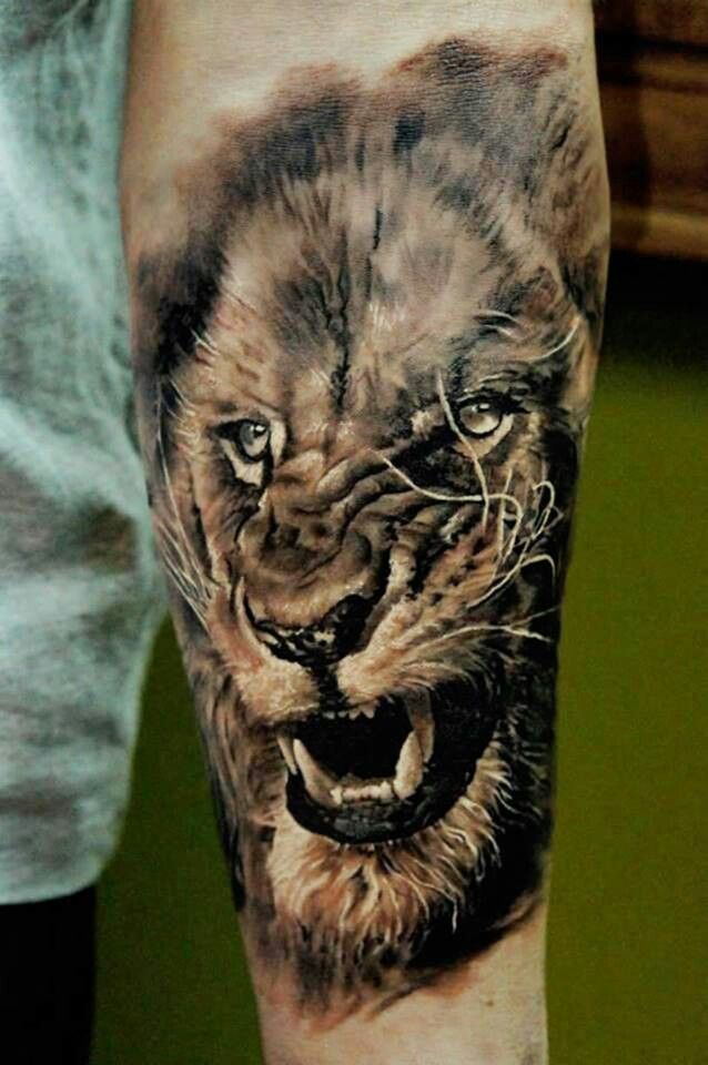 Angry Lion Face Tattooo On Forearm
