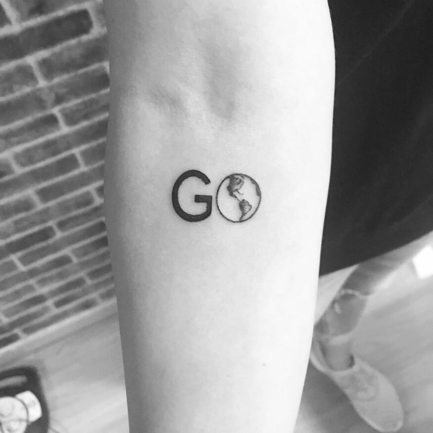 Beautiful GO Travel Tattoo On Arm
