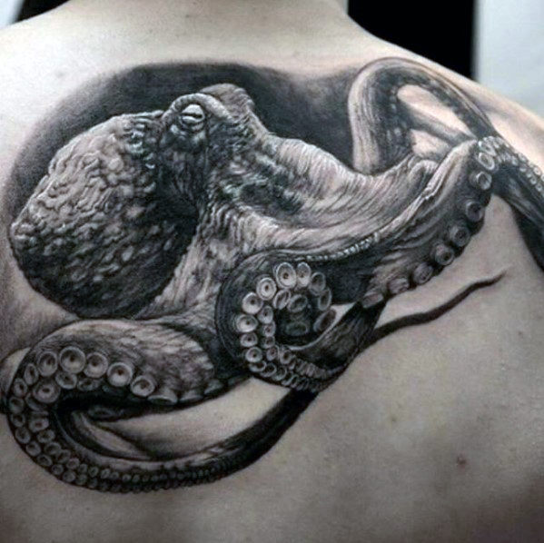 Black & Gray Shaded Realistic Octopus Tattoo On Upper Back