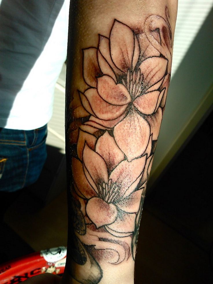 black and white lotus flower tattoo