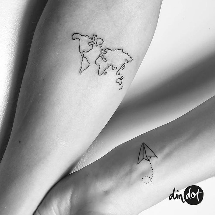 Black Outline World Map and Paper Plane Travel Tattoos On Forearms