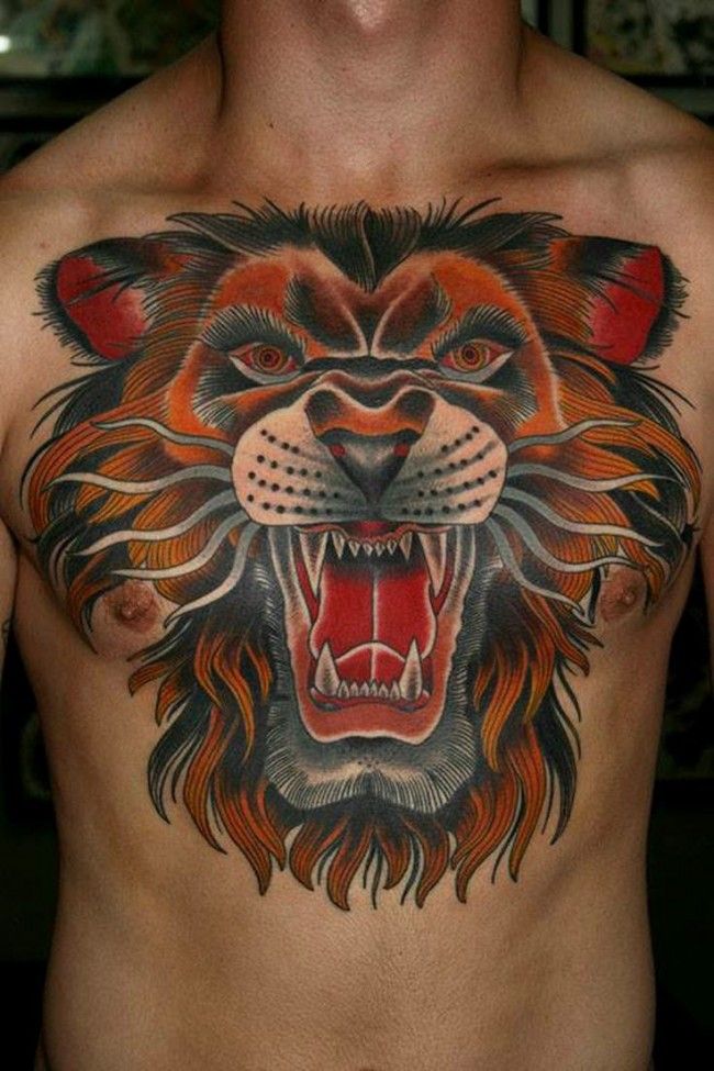 Colorful Angry Face Lion Tattoo On Chest