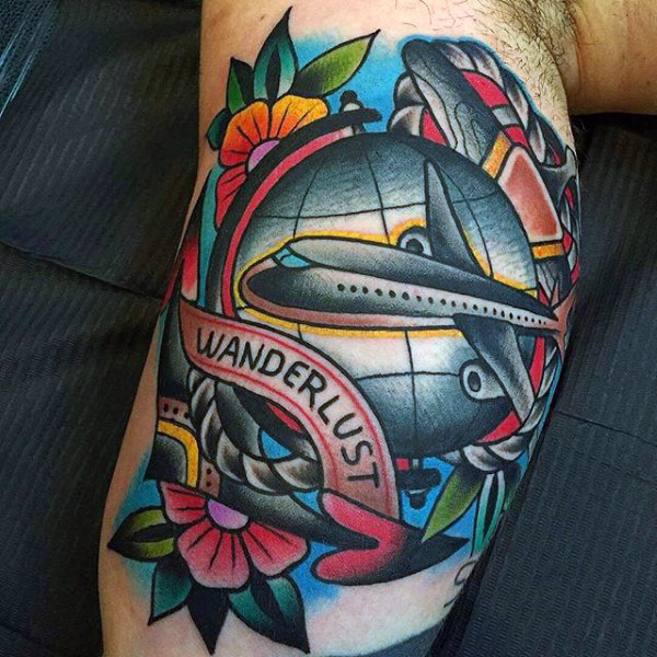 Colorful Globe With Flying Airplane & Wanderlust Ribbon Travel Tattoo On Bicepo