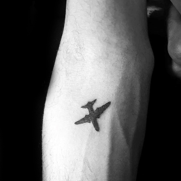 Cool Tiny Black Airplane Tattoo For Travel Lovers
