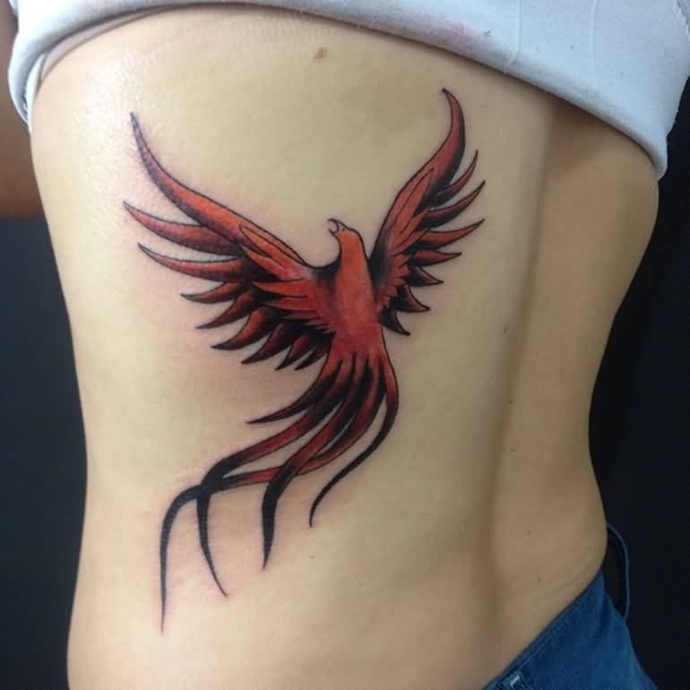 Cute Phoenix Tattoo On Back For Girls