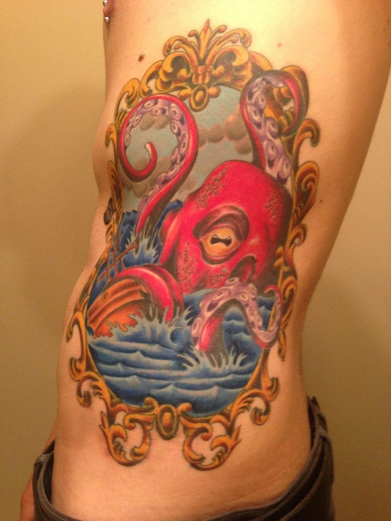 Golden Framed Red Octopus in Ocean Tattoo On Siderib