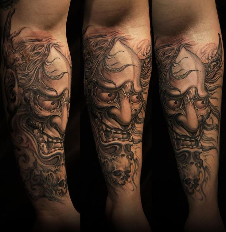 Grey Ink Japanese Demon Tattoo On Forearm