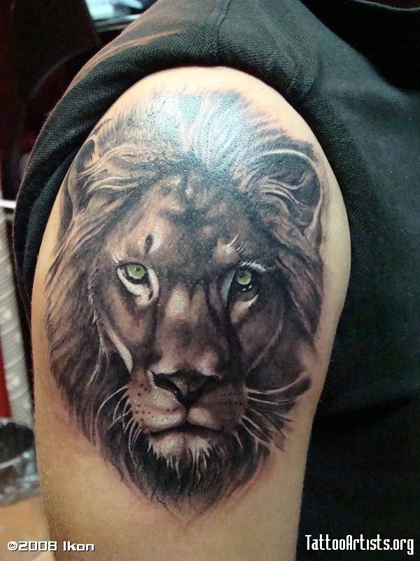 Grey Ink Lion Head tattoo On Shoulder