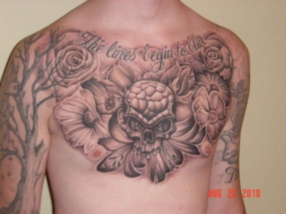 Grey Ink Skull & Flowers Tattoo On Chest
