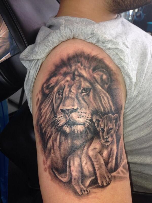 Lion And Cub Tattoo On Bicep