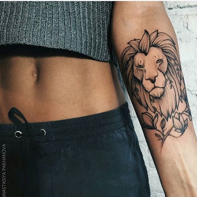 Lion With Flowers Tattoo On Forearm