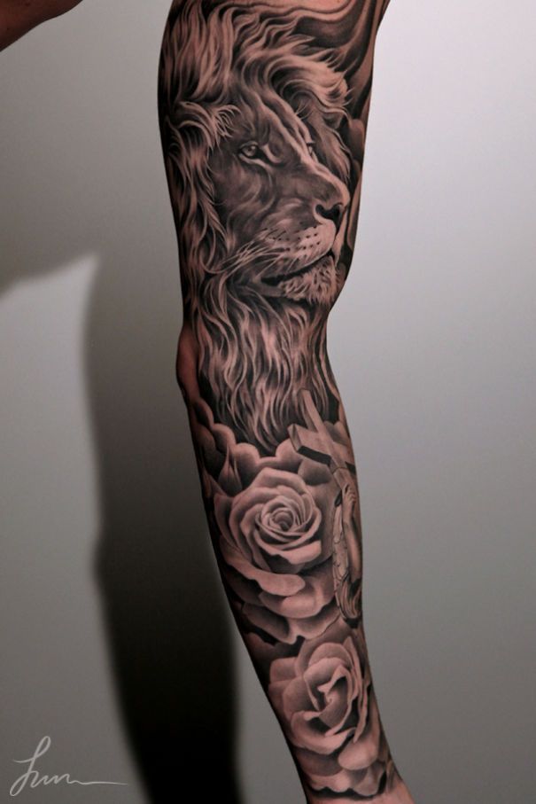 Lion and Flowers Tattoo On Full Back