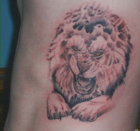 Male Lion Tattoo On Side