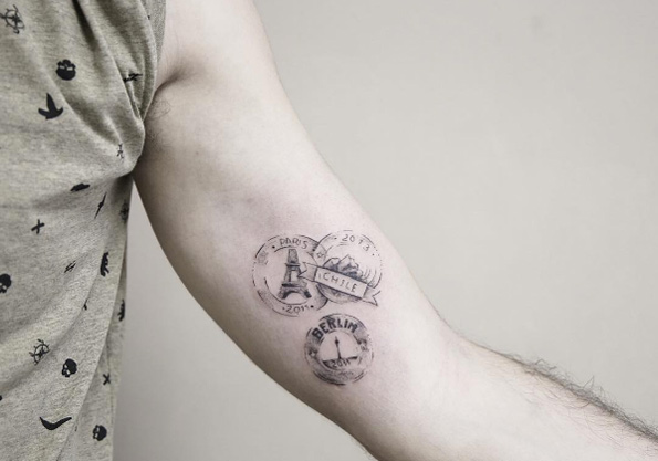 Paris, Chile, Berlin Stamp Tattoos by Luiza Oliveira for Travel Lover